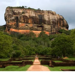 Sigiriya Lion Rock fortress rising above the gardens in Sri Lanka